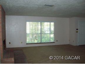 115 NW 30 St - Photo 3 of 12