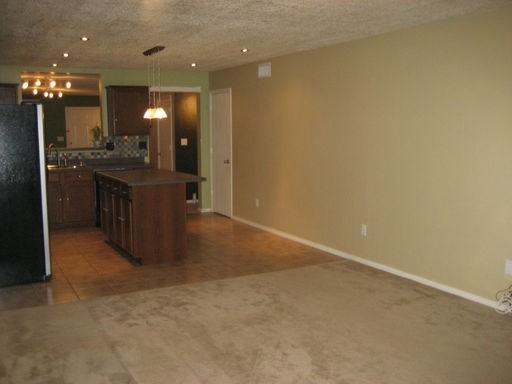 9547 Sun Dancer Dr NW - Photo 3 of 4