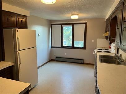 Pleasant Street Apartments - Photo 2 of 14