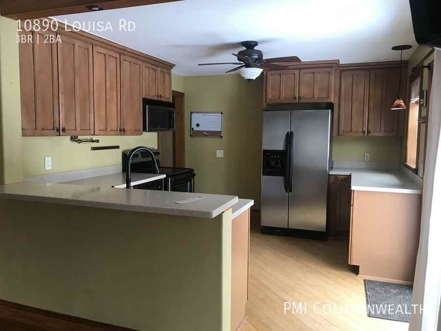 10890 Louisa Rd - Photo 3 of 12