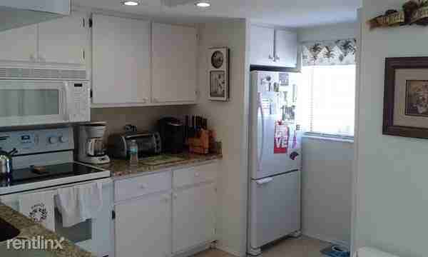 Naples Trace Condominiums - Photo 3 of 17