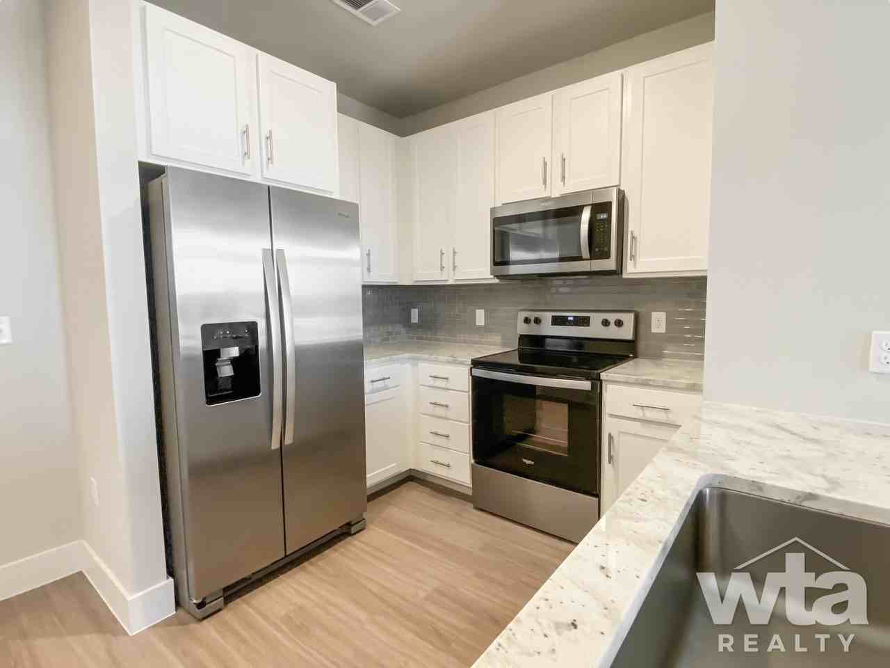 6000 ED BLUESTEIN BLVD - Photo 2 of 15