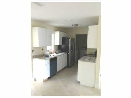 3230 NW 18th Pl - Photo 2 of 3