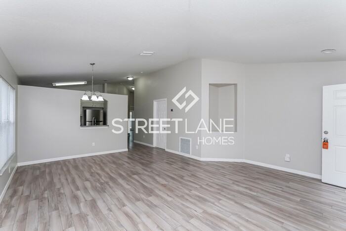 12725 Adventure Dr - Photo 3 of 15