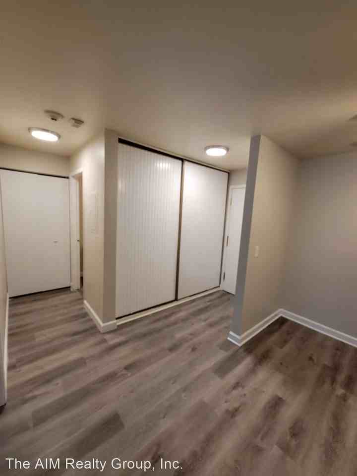 Updated Apartment With NEW KITCHEN & BATH With Balcony/Patio/Private Parking! - Photo 2 of 9
