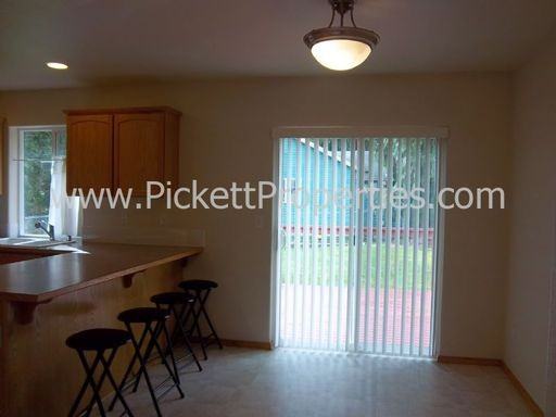 5421 NE Gamblewood Rd - Photo 3 of 7