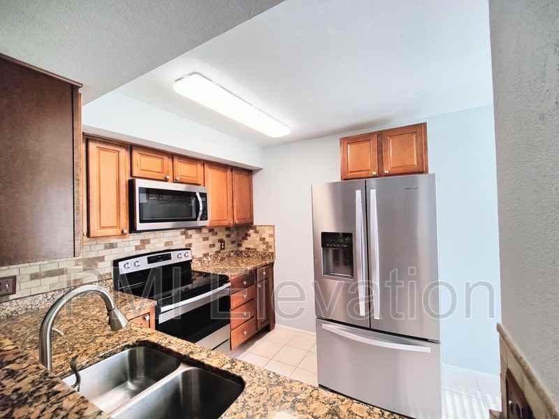 2696 S Xanadu Way #B - Photo 2 of 13