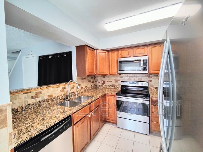 2696 S Xanadu Way #B - Photo 3 of 13