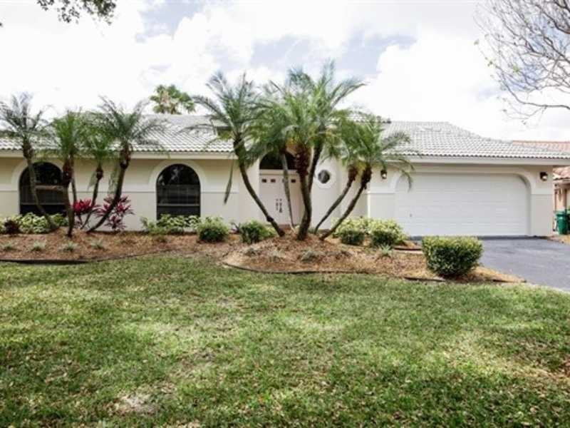 5166 NW 99th Way - Photo 2 of 12