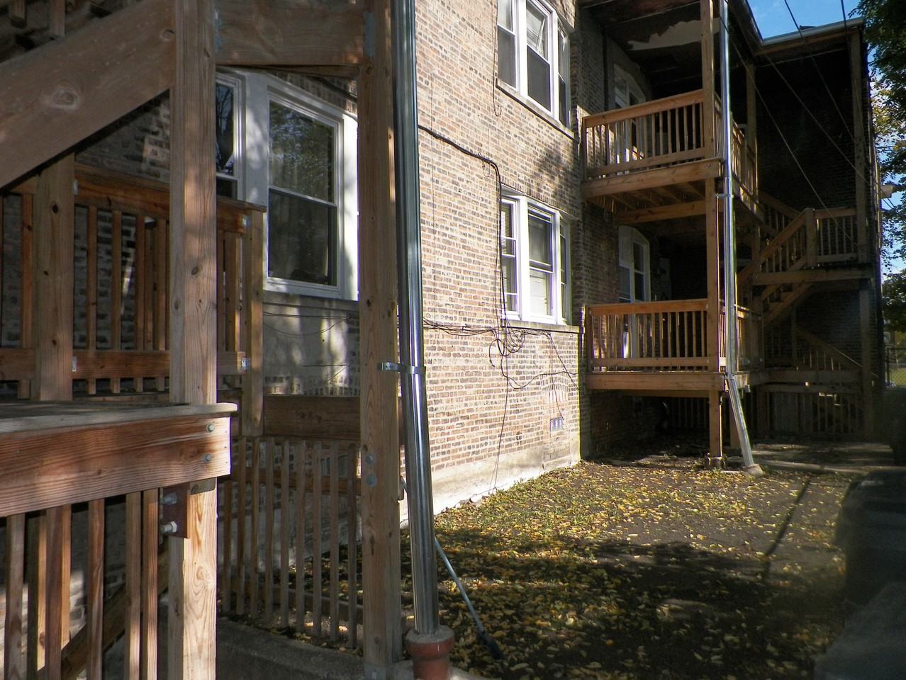 1145 W 70th St - Photo 3 of 16