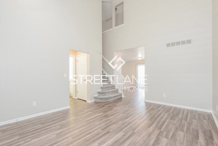 5631 S Versailles St - Photo 3 of 15