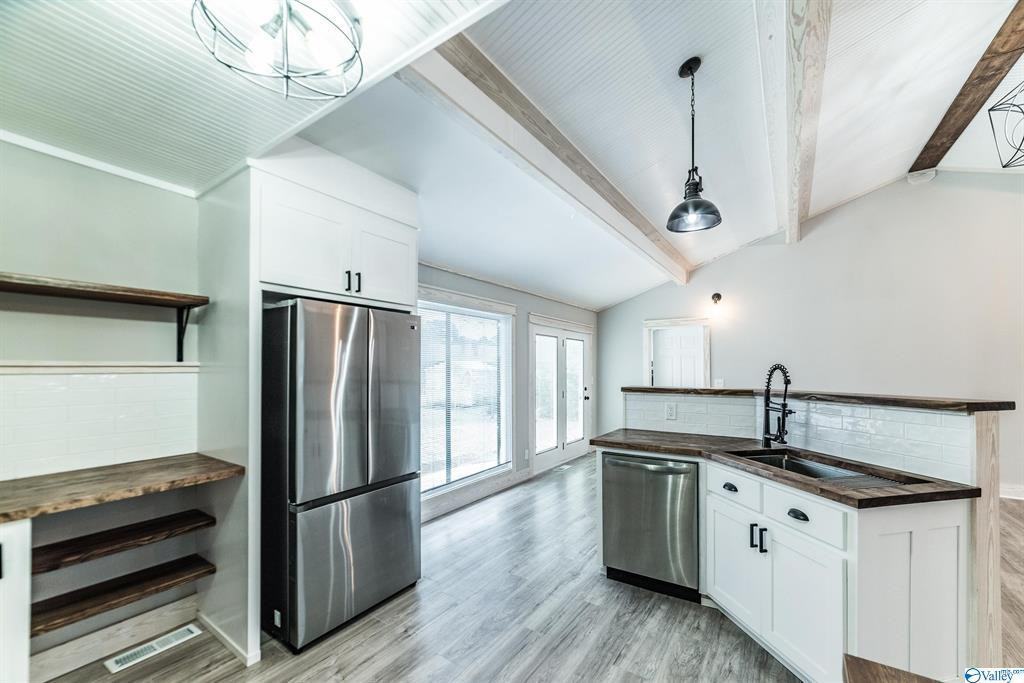 8303 Bailey Cove Rd Se #1 - Photo 4 of 40
