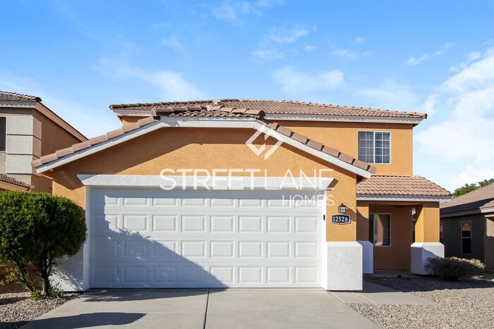 12528 W Myer Ln - Photo 3 of 15