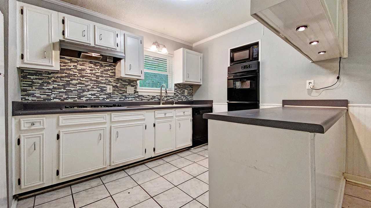 1201 Neal Pickett Dr #1 - Photo 3 of 12