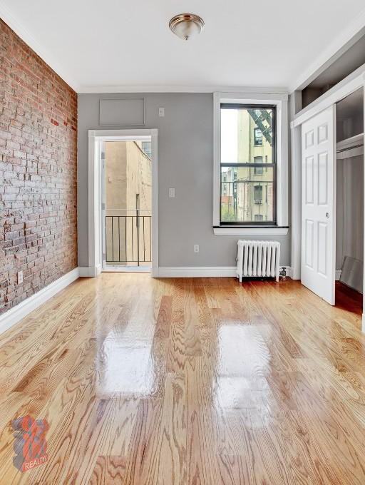 E 10th St #1A - Photo 2 of 6