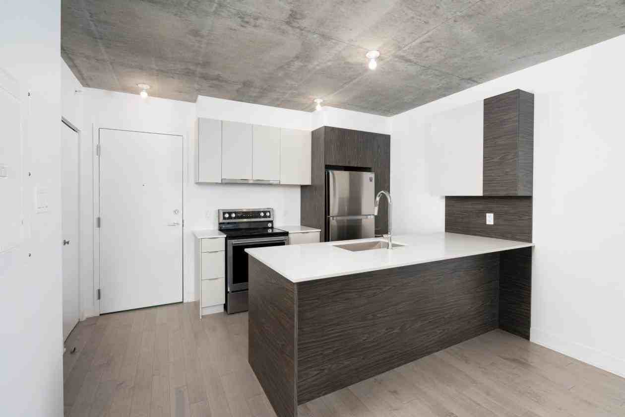 301 Avenue de l'Académie #208 - Photo 2 of 27