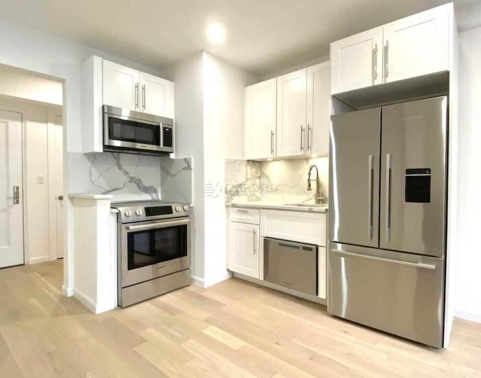 E 48th St #J2 - Photo 3 of 5