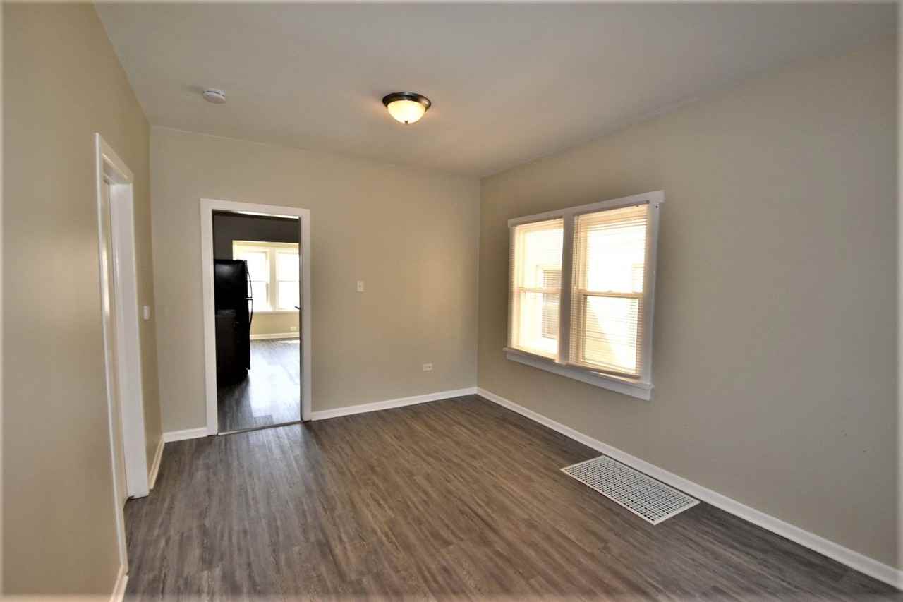 7661 W Fullerton Ave - Photo 3 of 12