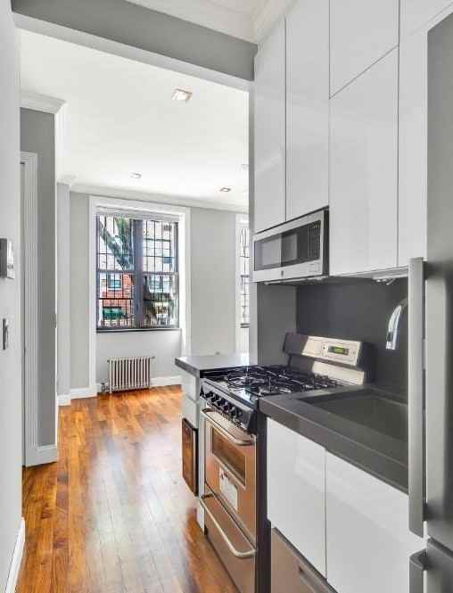 329 E 58th St #A - Photo 7 of 9