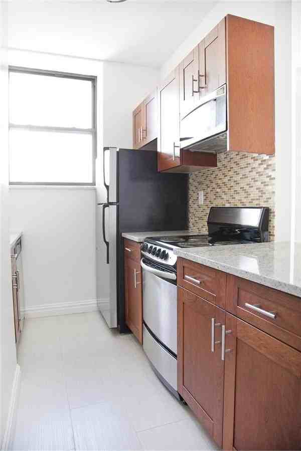 W 34th St - Photo 3 of 5