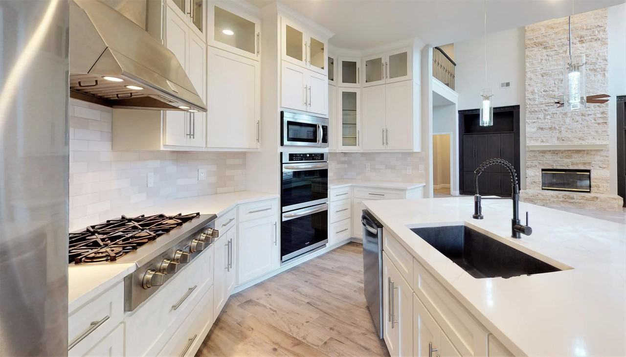 Spacious Plano home with outdoor pool & spa oasis - Photo 7 of 32