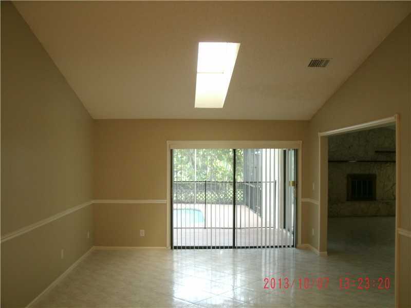10047 NW 2nd St - Photo 2 of 6