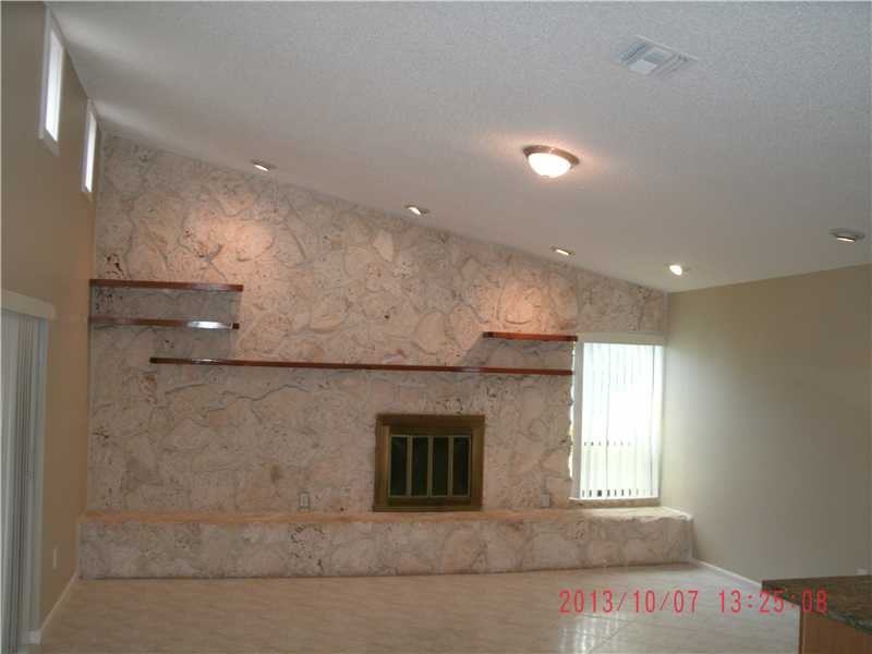 10047 NW 2nd St - Photo 3 of 6