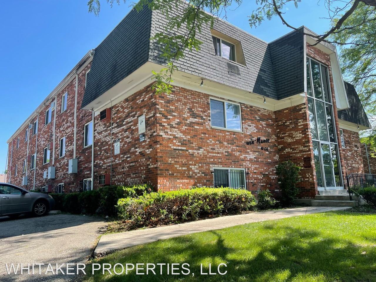 TWIN MANOR APARTMENTS - Photo 3 of 4