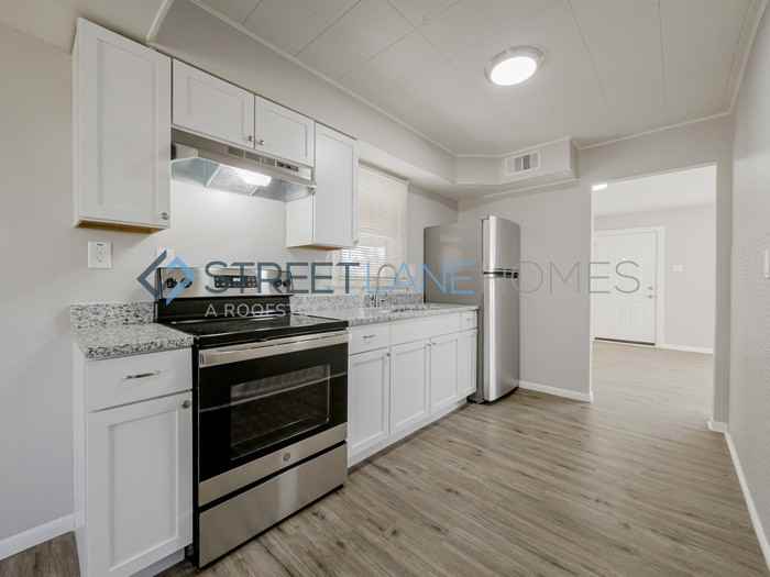 9101 Belcour Dr - Photo 3 of 16