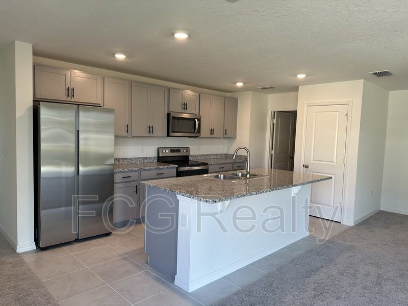 1195 Papaya Cir - Photo 3 of 13