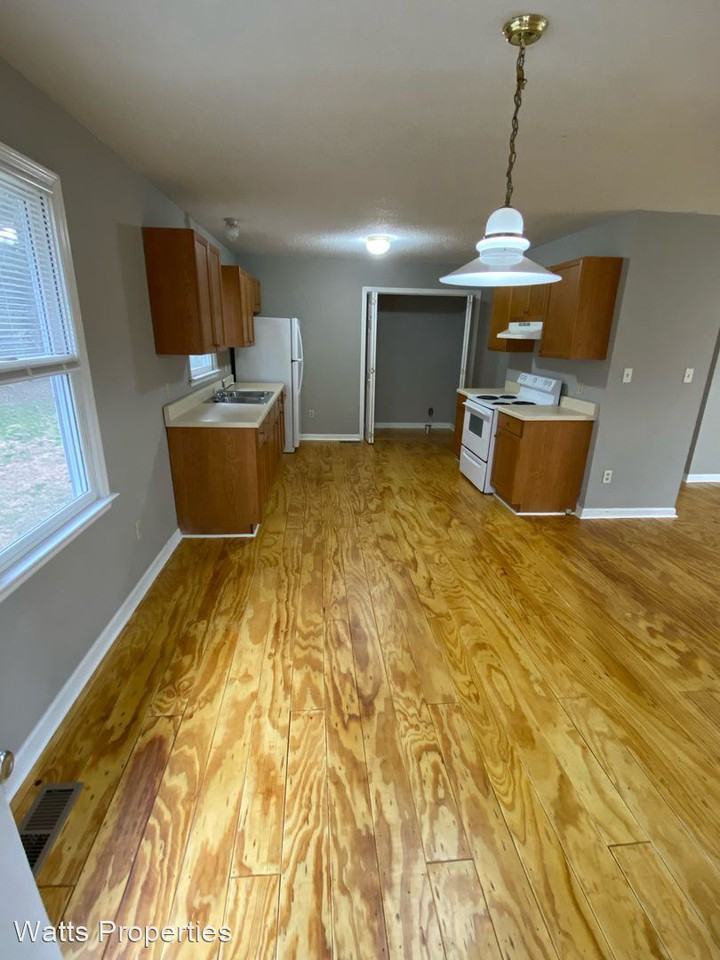 8th Avenue NW - Photo 2 of 6