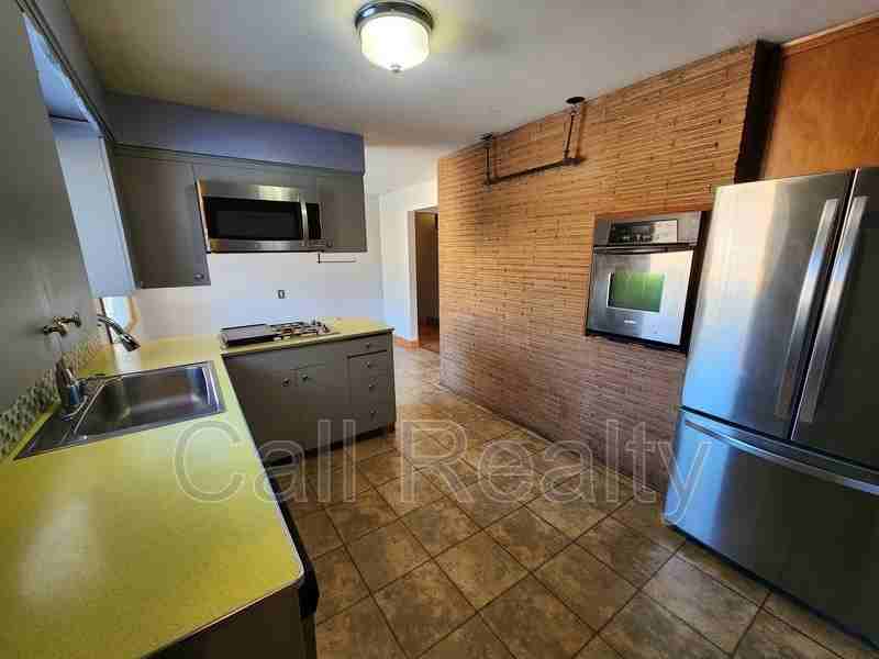 7617 E Euclid Ave - Photo 5 of 16