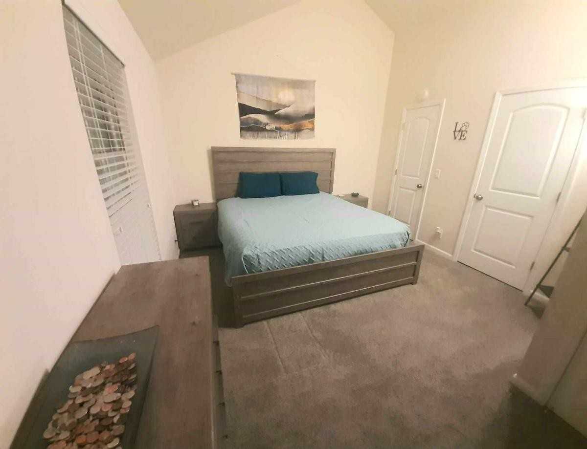 9002 W 64th Ter - Photo 7 of 15