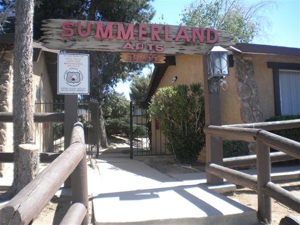 SUMMERLAND - Photo 2 of 4