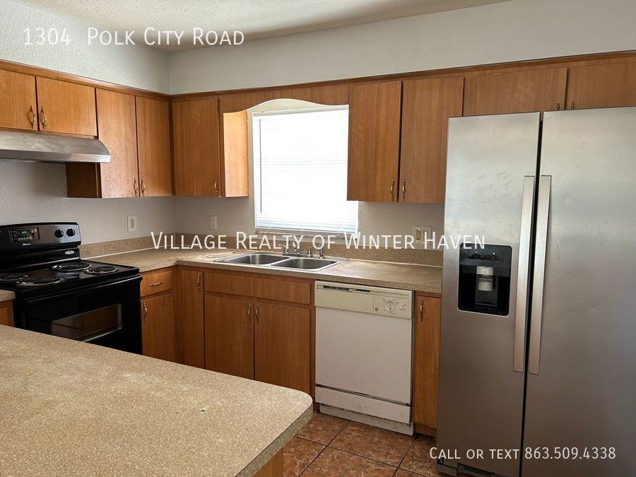 1304 Polk City Rd - Photo 3 of 16