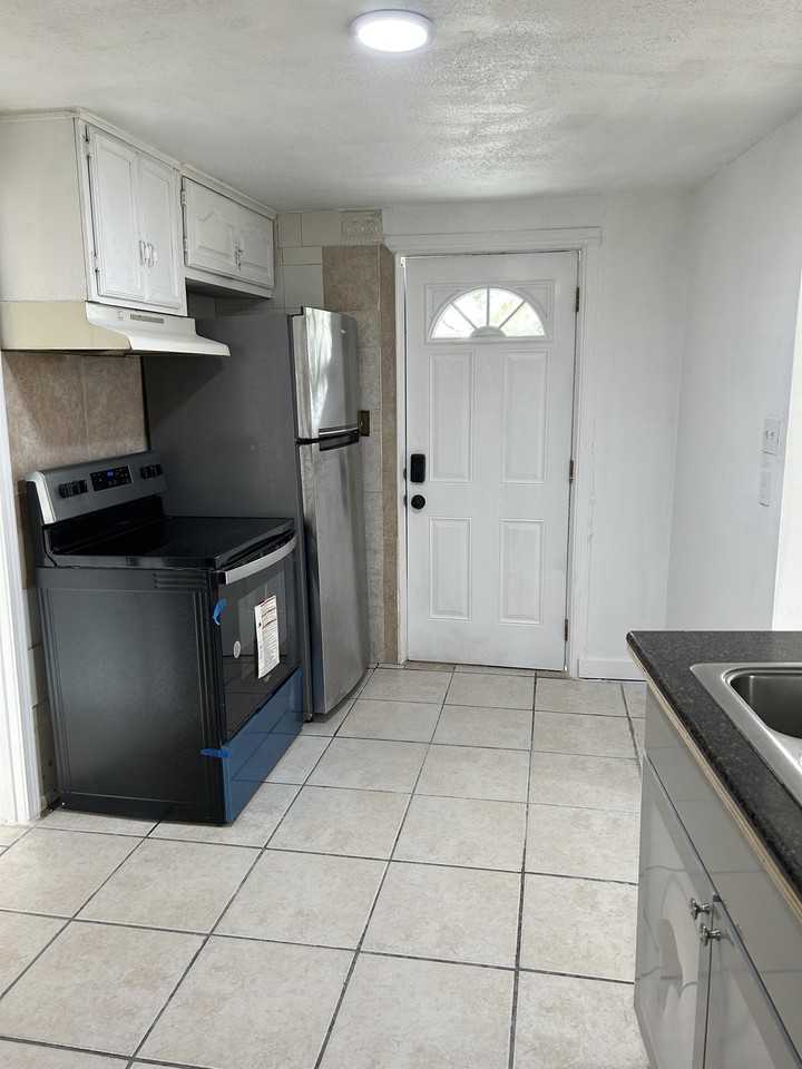 7912 Alexia Ave #1 - Photo 3 of 9