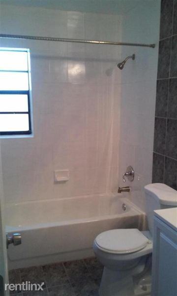 1071 NW 25th Way - Photo 2 of 9