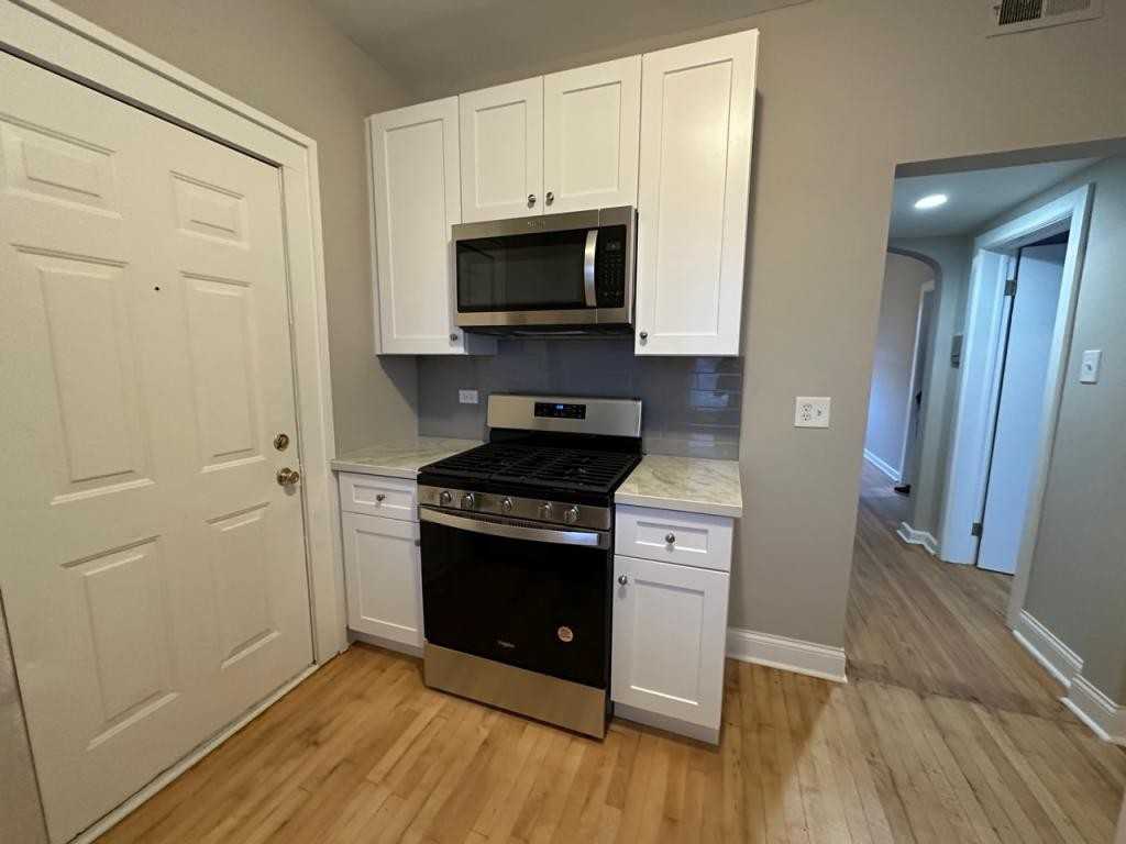 6150 S Sacramento Ave - Photo 2 of 8