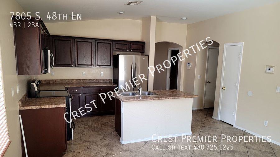7805 S 48th Ln - Photo 3 of 9