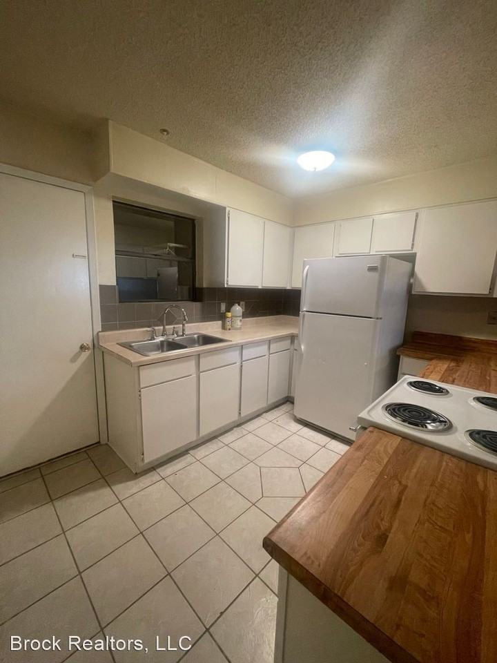 318/320 Alameda Road - Photo 2 of 13