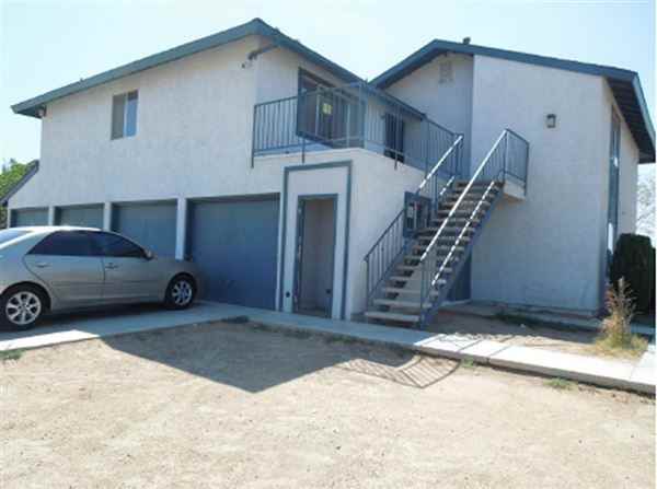 Poinciana Aparrtments - Photo 2 of 6