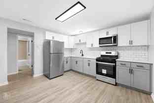 5032 S St Lawrence Ave - Photo 1 of 1