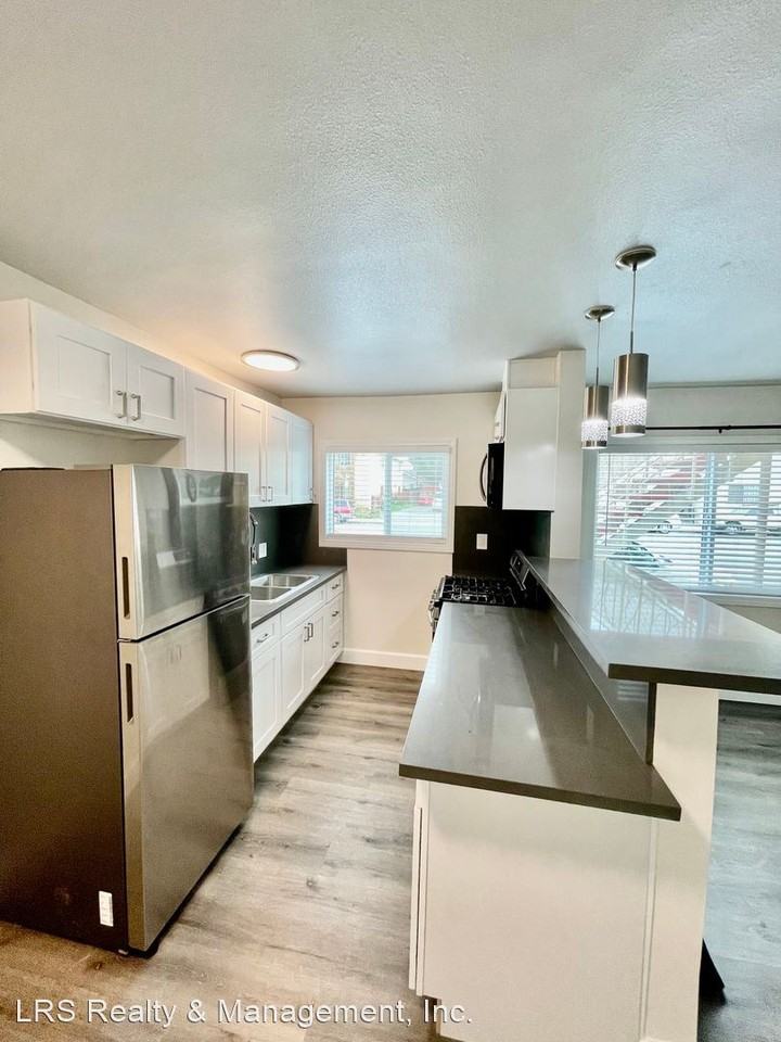 3711 S. Normandie Ave. - Photo 2 of 6