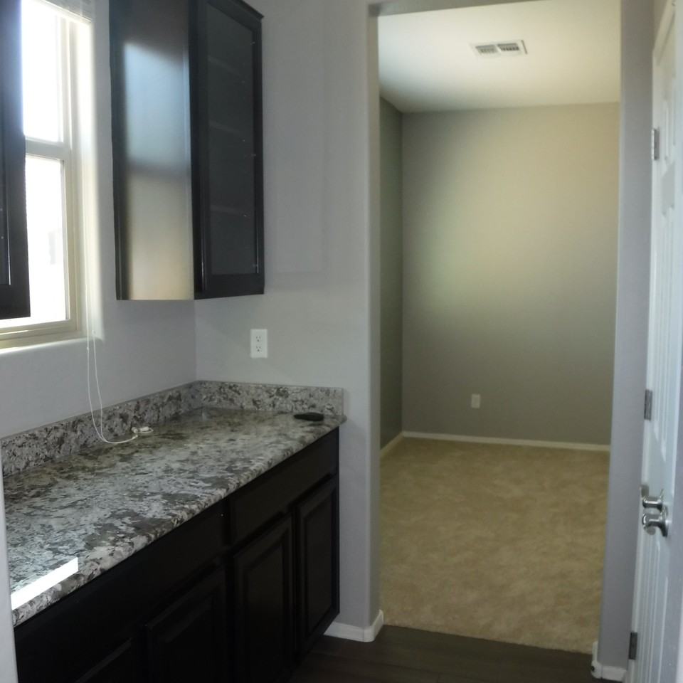 561 N 158th Dr - Photo 2 of 6