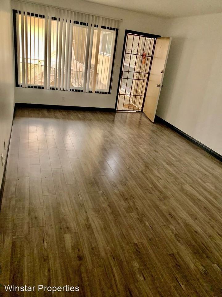 Manhattan Manor - Photo 3 of 16