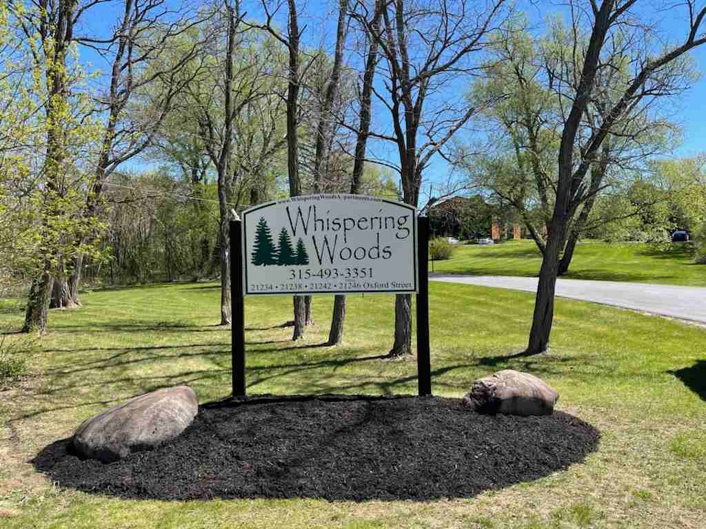 Whispering Woods Apartments - Photo 2 of 53