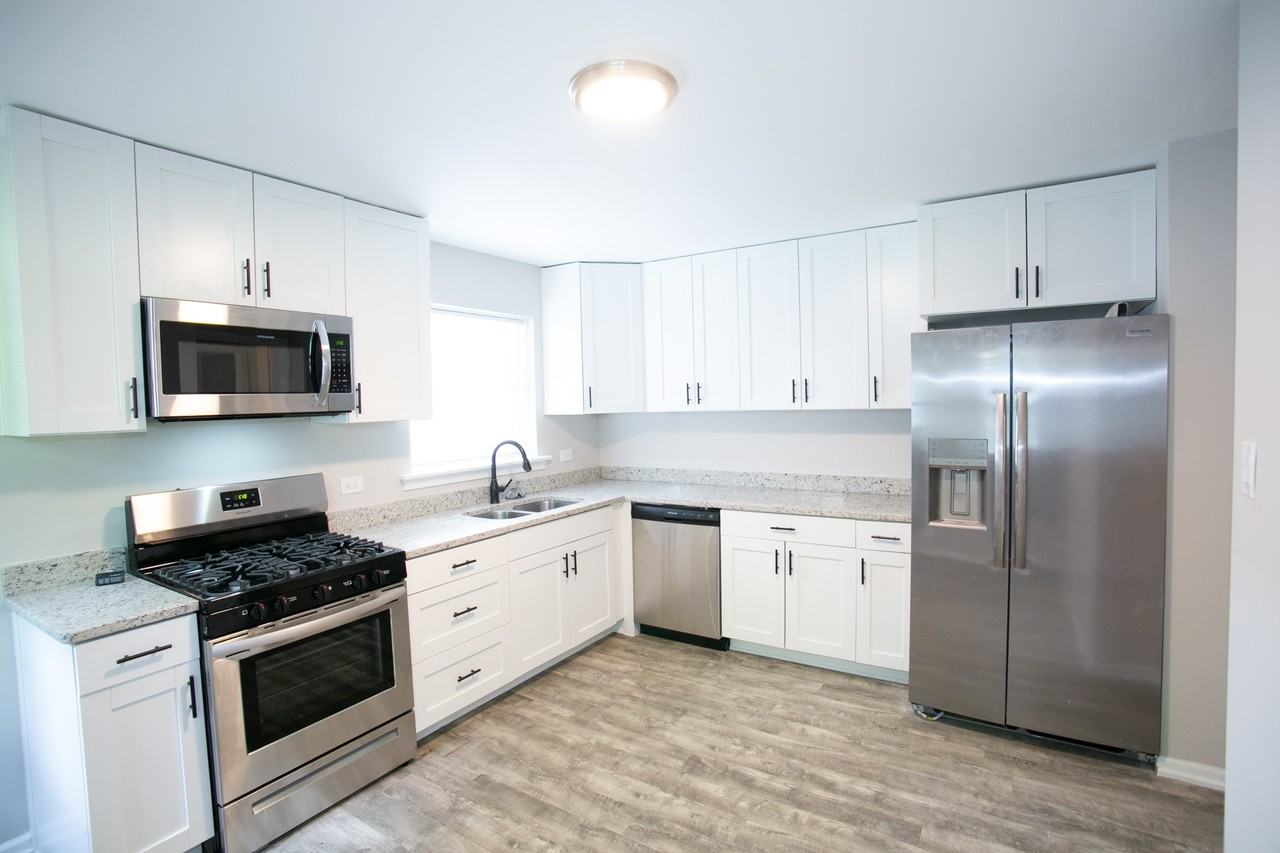 8837 S Talman Ave #1 - Photo 2 of 32