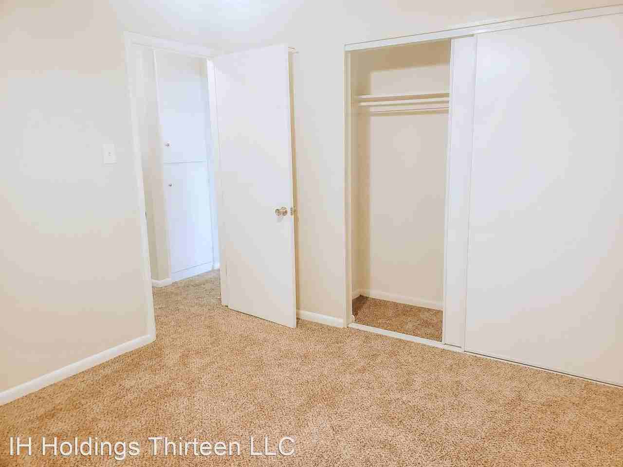 Village Green Apartments - Photo 2 of 6