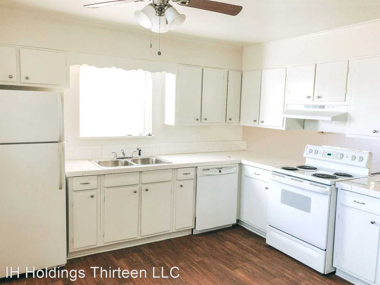 Village Green Apartments - Photo 3 of 6