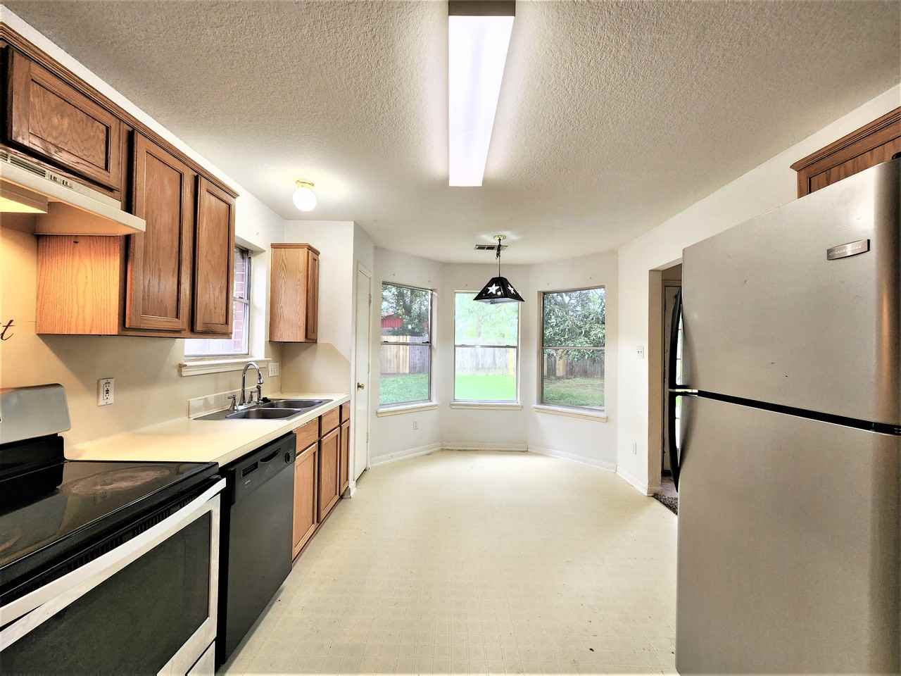 5819 Flower Gate Dr - Photo 4 of 11